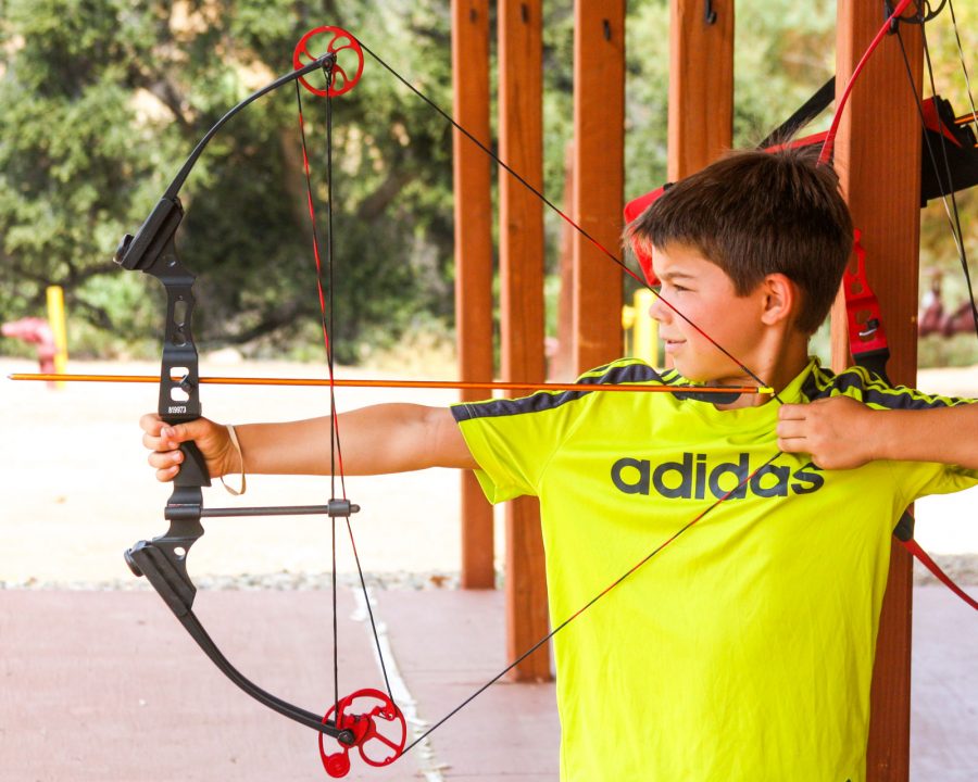 Camper taking archery lessons
