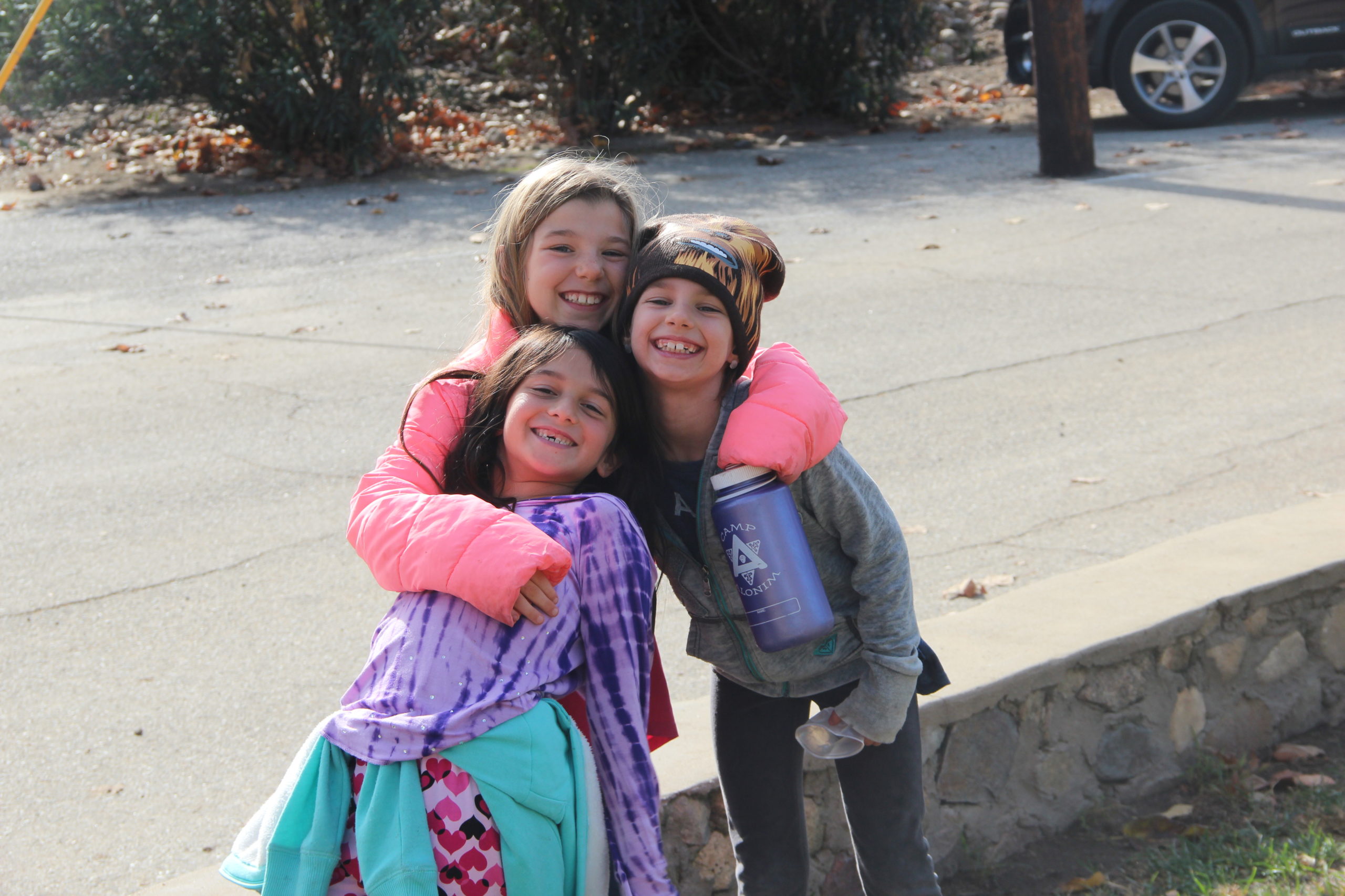 campers in winter coats and hats